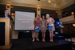 Volunteers Juliana Meidl and Terri Miller with Gina Kell Spehn